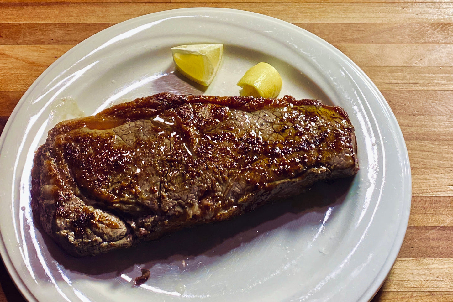 CAST IRON STEAK WITH OLIVE OIL AND LEMON